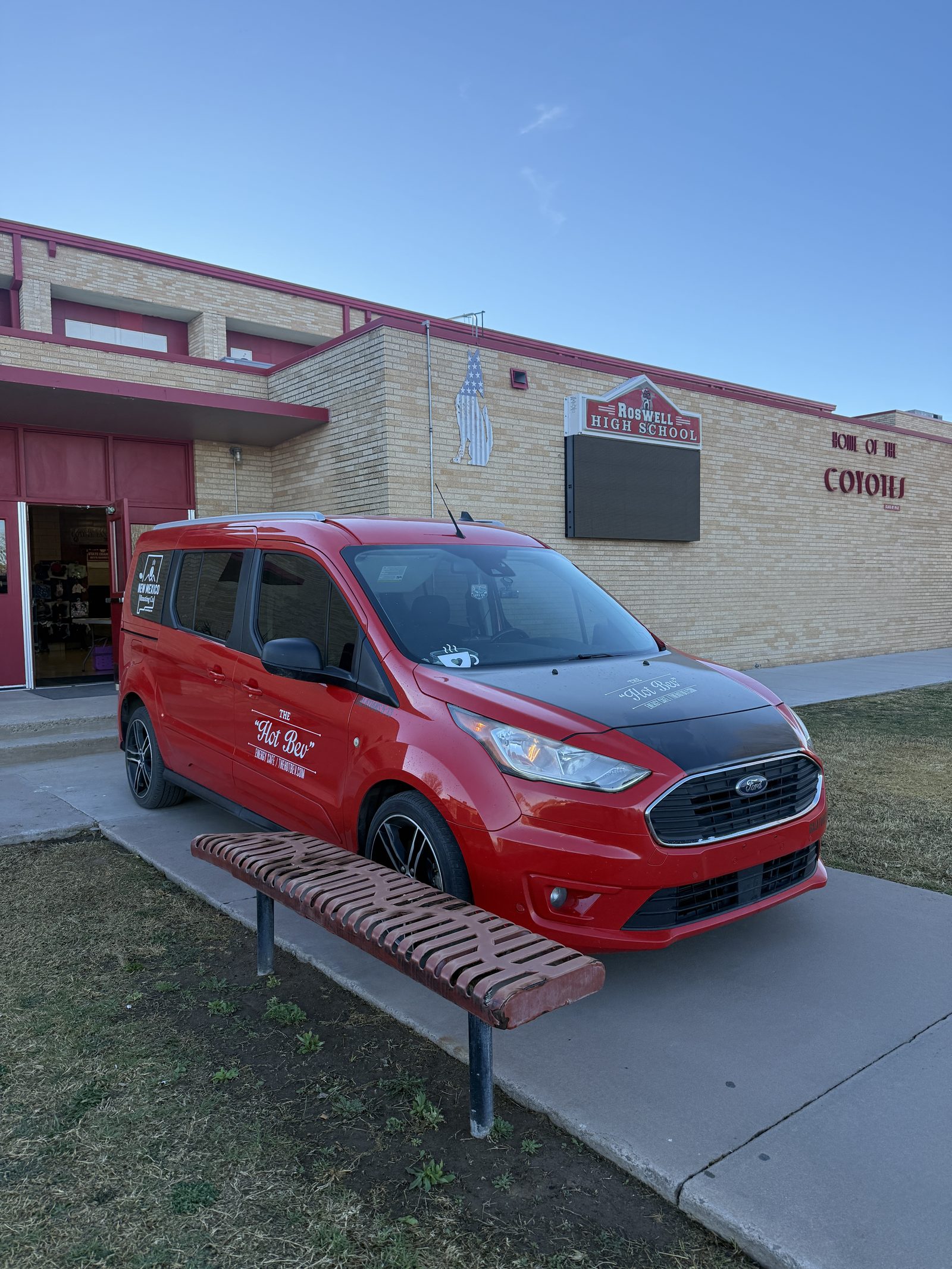 The Hot Bev branded Ford Transit van parked outside Roswell High School for an event